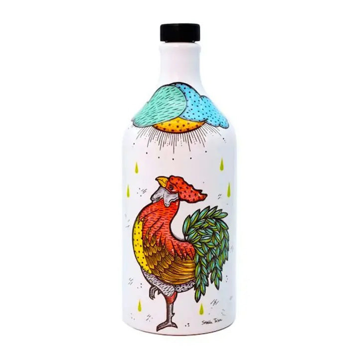 The MURAGLIA - ROOSTER EXTRA VIRGIN OLIVE OIL BOTTLE by ZIA PIA IMPORTS features handcrafted ceramic artwork of a rooster adorned with vibrant red, yellow, and brown feathers, along with a green tail. Above the rooster, a cloud releases multicolored raindrops. Created by Apulian artisans, this unique piece is perfect for holding extra virgin olive oil and comes with a black cap.