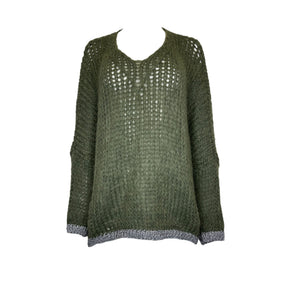 Introducing the LULA V NECK SWEATER WITH LUREX TRIM by DEBBIE KATZ: a cozy, oversized long-sleeve olive green knit sweater featuring a loose, open-knit pattern. This soft wool sweater boasts a v-neckline secured with a single button and is beautifully finished with a contrasting gray lurex hem at the bottom. The drop shoulder style sleeves make it perfect for layering against a plain white background.