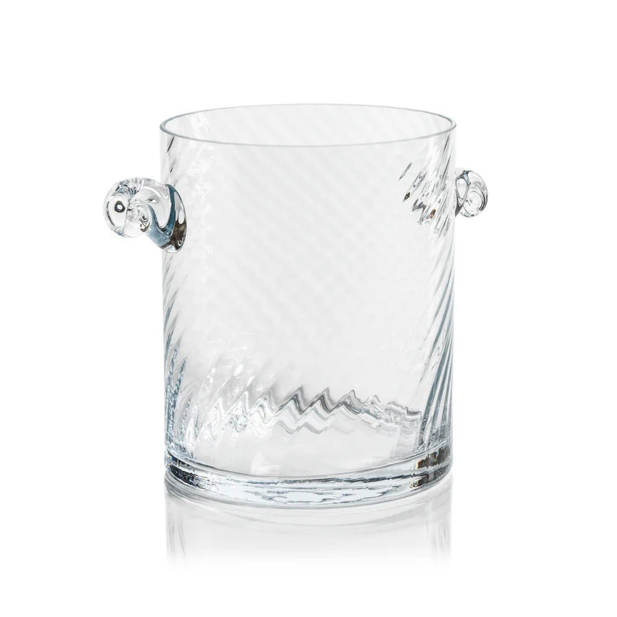 The BAGATELLE SWIRL GLASS ICE BUCKET by ZODAX features a clear, textured spiral design with diagonal swirls and two round handles—a modern bar accessory shown on a white background.
