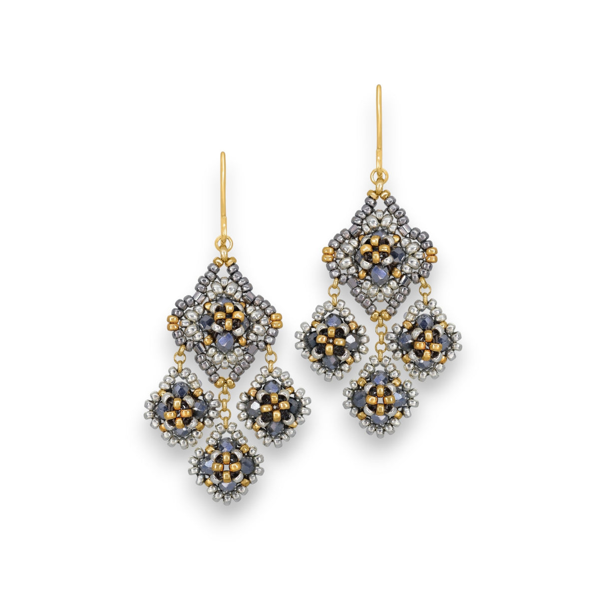 The MIGUEL ASES Crystal Miyuki Chandelier Earrings by MIGUEL ASES, INC. feature intricate beaded designs in silver, gold, and black, with metallic hues forming diamond-shaped patterns for a dazzling effect.