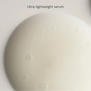 On a softly lit surface rests a bottle of ELEMIS - PRO-COLLAGEN FUTURE RESTORE SERUM by ELEMIS - STEINER, with text emphasizing its proven ability to firm skin and reduce wrinkles in just 4 days. Infused with potent marine actives and featuring the innovative opal skin algae complex, this serum represents the next generation of advanced skincare. A blurred hand is visible in the background.
