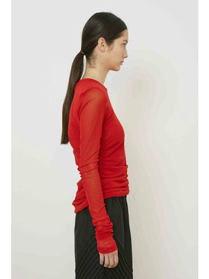 A close-up of MEIMEIJ's MESH LAYERING TOP in brown shows its subtle diagonal weave and fine fibers—perfect for a minimalist look.