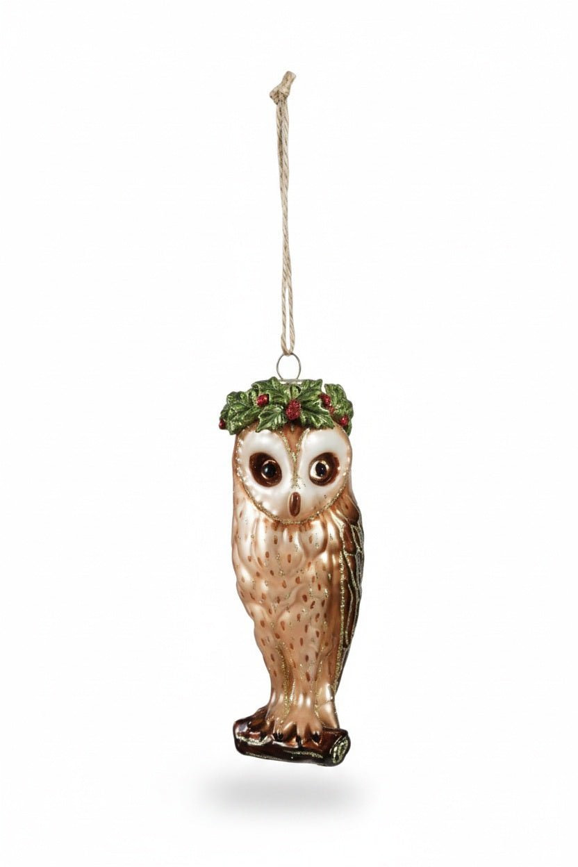 OWL ORNAMENT WITH CROWN AND GLITTER: a hand-painted glass owl ornament perched on a branch and wearing a holly crown.