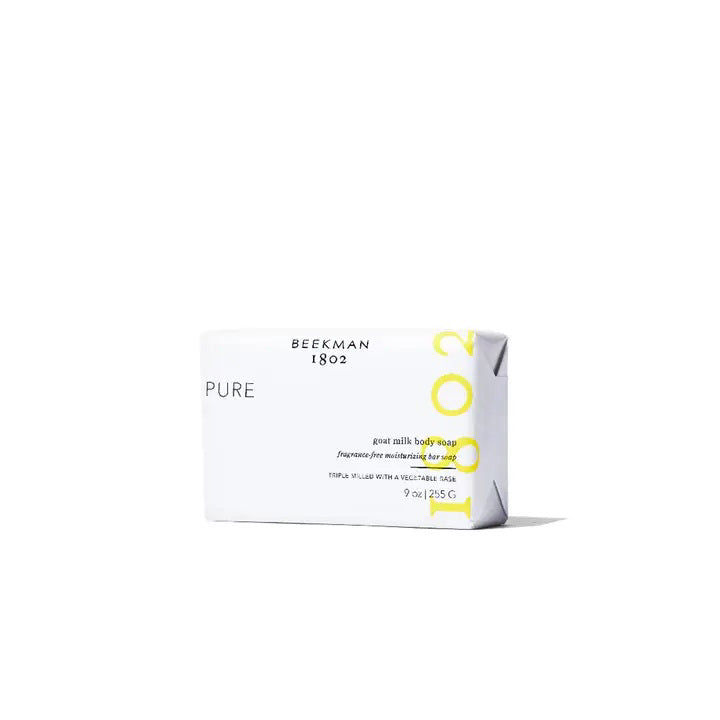 A white bar of PURE GOAT MILK 3.5 SOAP by BEEKMAN - STA ELEMENTS in rectangular packaging with yellow accents is centered on a plain white background.