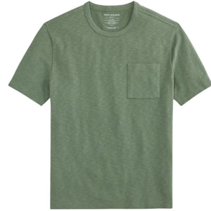 A person wears the MACK WELDON Heavyweight Slub Cotton Pocket T-Shirt in Cactus, a light olive green relaxed fit short-sleeve tee with a chest pocket, shown cropped to the upper torso against a plain white background.