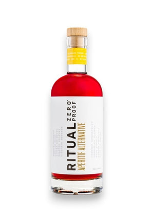 A clear glass bottle of Ritual Zero Proof Aperitif Alternative, featuring vibrant red liquid and a white label with bold black and yellow text—perfect for making a refreshing non-alcoholic spritz or Italian aperitivo.