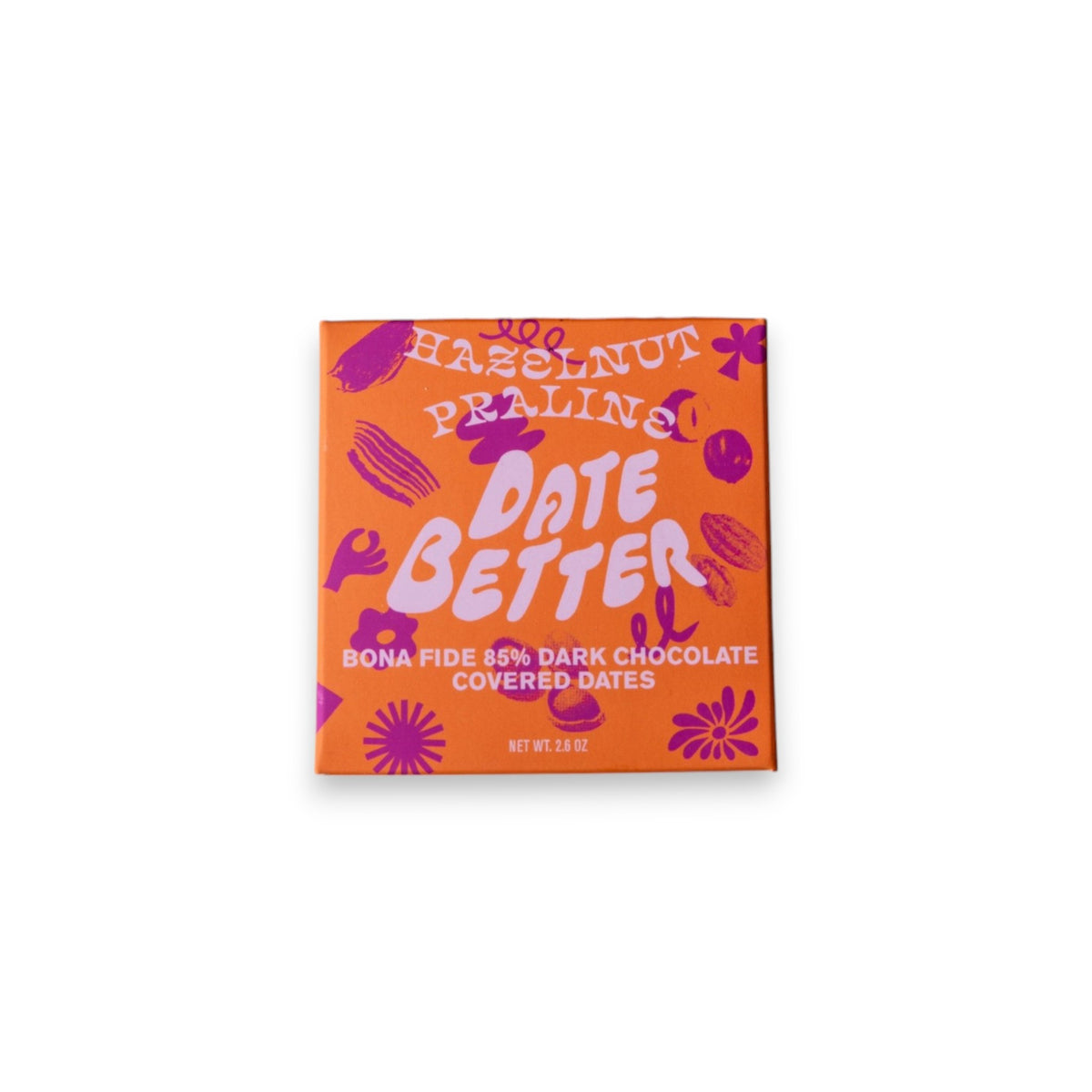 The "DATE BETTER - HAZELNUT PRALINE COVERED DATES" from DATE BETTER SNACKS features orange packaging with bold pink and purple text, adorned with abstract flower and leaf patterns. This 85% dark chocolate Medjool date treat weighs 1.8 oz.