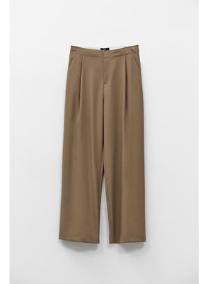 ELEH - TROUSER IN MUD GREY by ELEH: These mud grey, high-rise tailored trousers feature front pleats and a wide-leg silhouette that finishes at the ankle. The trousers are shown against a plain white background.