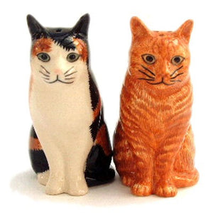 The QUAIL CERAMICS - ELEANOR & VINCENT CAT SALT & PEPPER SHAKERS by QUAIL DESIGNS feature an orange tabby and a black, white, and orange cat—ideal for any cat lover or to add charm to your kitchen decor.