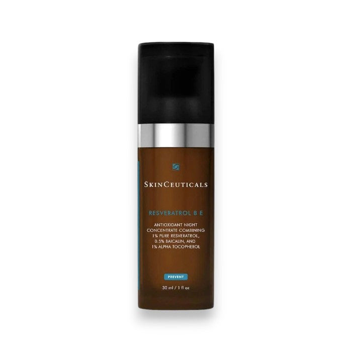 A bottle of SKINCEUTICALS - RESVERATROL B E SERUM, an antioxidant face serum from SKIN CEUTICALS. This skincare product is packaged in a dark brown cylindrical bottle with a black pump dispenser and cap. The label features text detailing the product&#39;s name and some active ingredients. The bottle holds 30 mL.