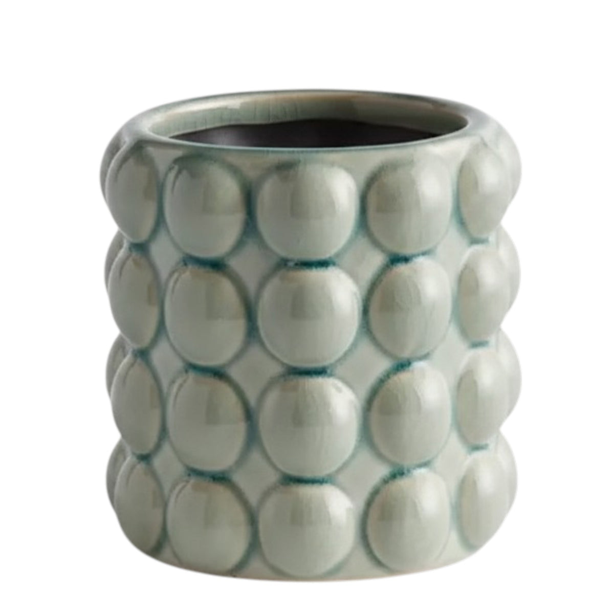 The NAPA HOME AND GARDEN - VALENCIA POT, SMALL by NAPA HOME AND GARDEN is a light green contemporary planter with a glossy seafoam glaze and a textured surface featuring raised circular bumps arranged in a grid pattern.