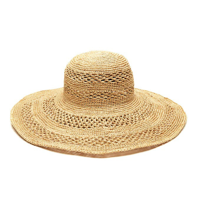 MAR Y SOL - SIENNA SUN HAT by MAR Y SOL features a wide brim, rounded crown, and stylish crocheted raffia design, showcased against a white background.