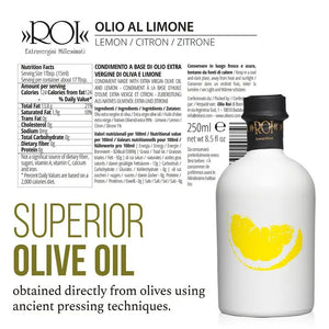 The MERCATO DI BELLINA Italian Lemon Infused Olive Oil comes in a white bottle with a black cap, gold lettering, and a yellow lemon wedge graphic—perfect for adding vibrant flavor to any dish.