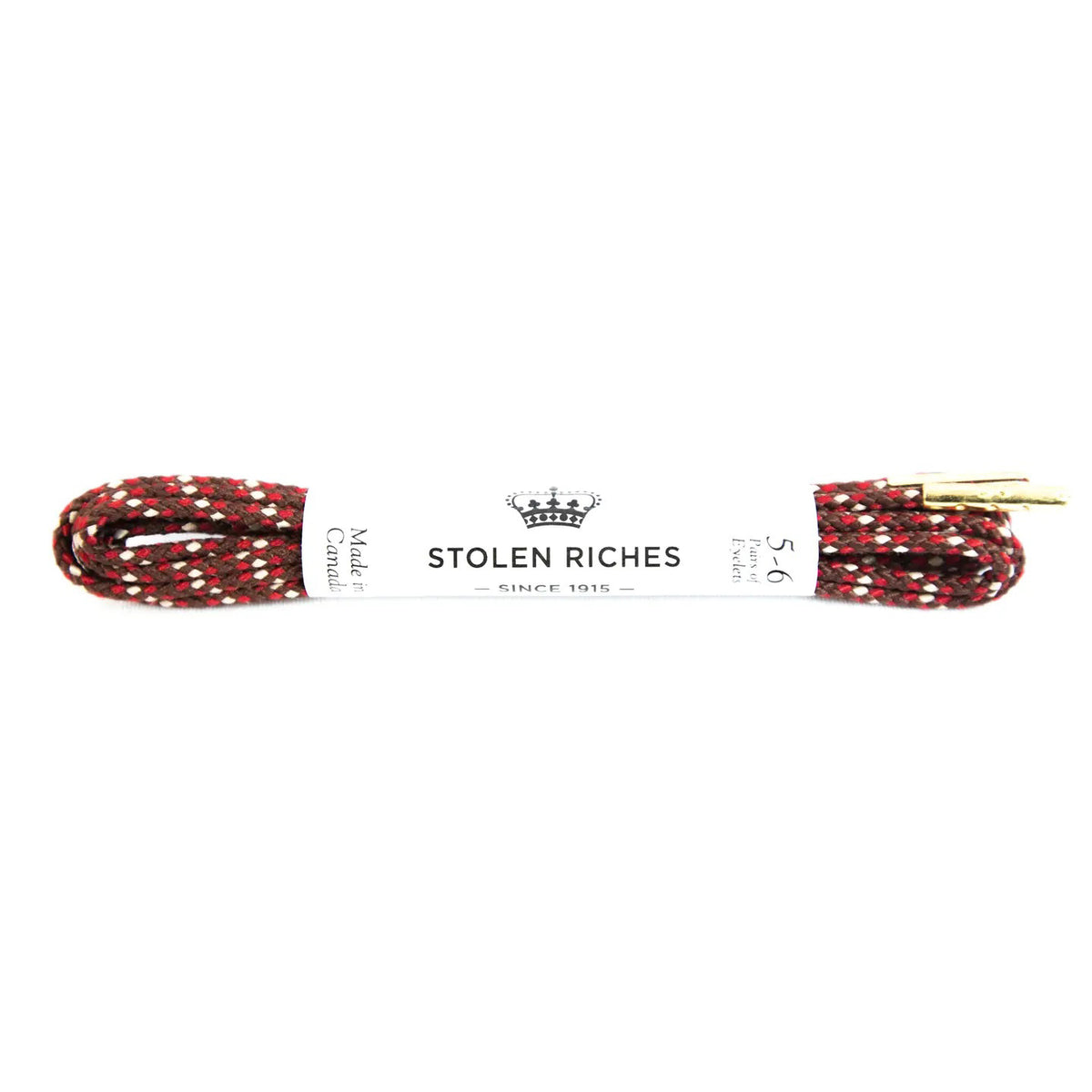 STOLEN RICHES - DRESS SHOELACES IN VIENNA: Premium red, black, and white patterned laces with metal tips, wrapped in a "Stolen Riches Since 1915" label. Crafted for style and durability.
