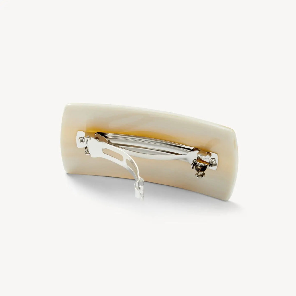 The MACHETE Jumbo Box Barrette in Alabaster, by MACHETE, is a rectangular ivory-hued hair accessory with smooth edges, shown on a plain white background.