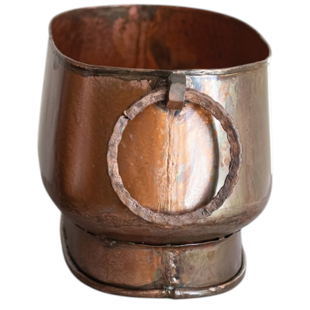 The OVAL METAL PLANTER WITH RING HANDLES, SMALL by CREATIVE COOP features a vintage oval design with ring handles and a charming, aged copper finish—an ideal accent for farmhouse decor.