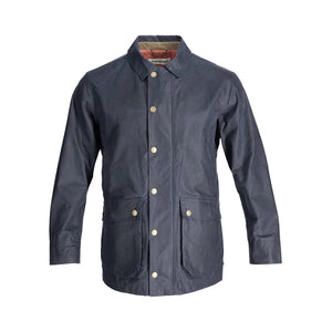 The TOM BECKBE Piedmont Jacket in Navy features waxed cotton, long sleeves, a collar, snap button closures, two large front pockets, and a contrasting interior lining. This weatherproof jacket combines classic style with durability.