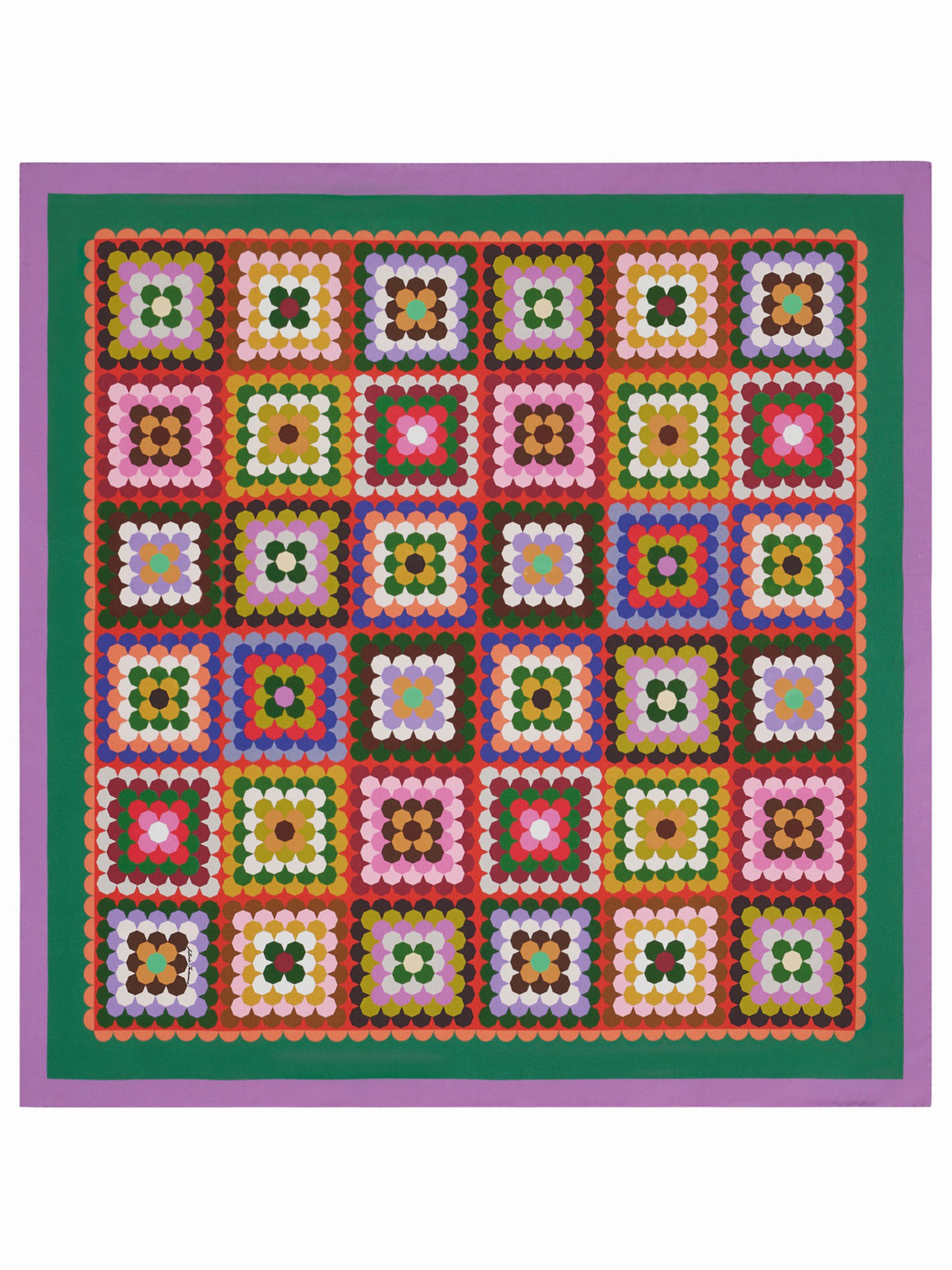 A vibrant quilt showcases geometric squares in pink, red, green, brown, white, and black with green and red borders—each echoing the bold design of the FRANCO FERRARI - CIALDA REVERSIBLE SILK SCARF by FRANCO FERRARI.