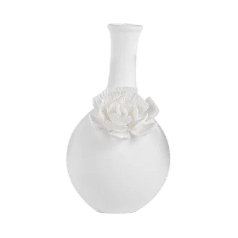 The CAMEO LONG NECK PORCELAIN BUD VASE by ZODAX is a round, white vase with a matte finish, featuring a narrow neck and a detailed floral embellishment on the front.