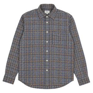 A close-up of the HARTFORD - PAUL Checked Flannel Shirt in Grey highlights the blue, brown, and grey plaid cotton fabric, with a focus on the cuff and sleeve featuring visible white buttons.