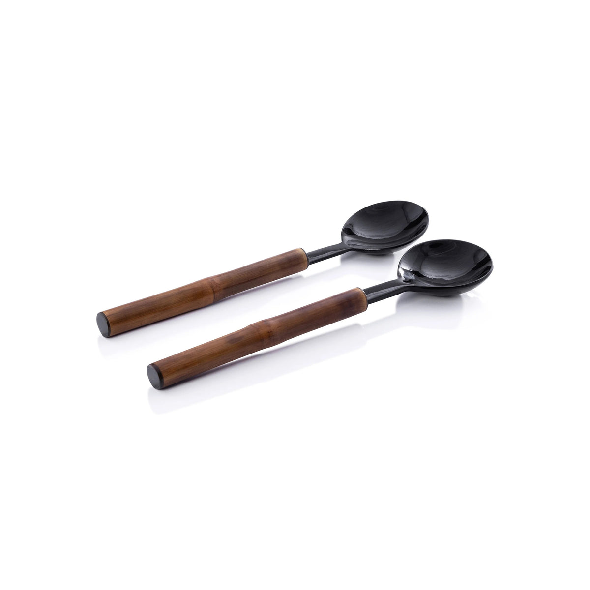 The ZODAX BAMBOO AND HORN SERVING SET features a spoon and slotted spoon with polished, horn-comb style handles in brown and black, elegantly crossed on a light textured surface.