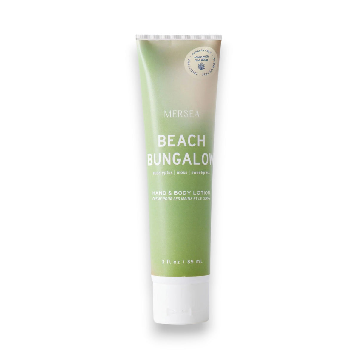 A tube of MERSEA - BEACH BUNGALOW SEA WHIP LOTION by MERSEA, featuring eucalyptus, Dead Sea Salt, moss, and sweetgrass. The green tube fades to white at the bottom and stands upright against a white background.