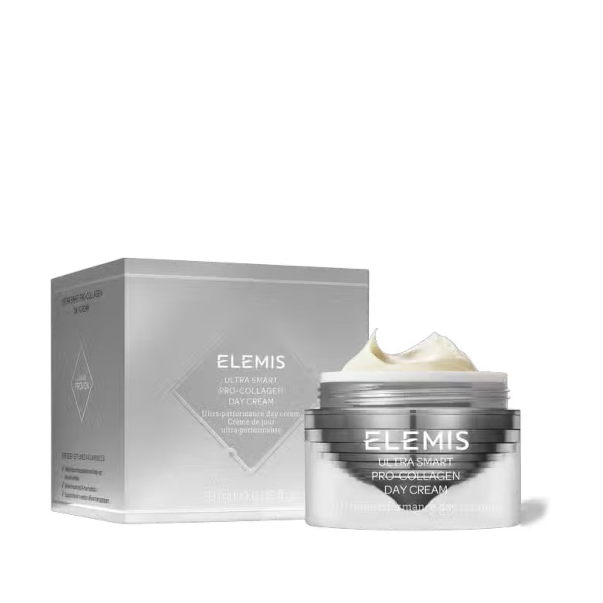 A hand holds a round silver container of ELEMIS - ULTRA SMART PRO-COLLAGEN DAY CREAM against a plain white backdrop. The lid is off, revealing an advanced cream with a light texture, infused with adaptogenic technology for enhanced skin balance.