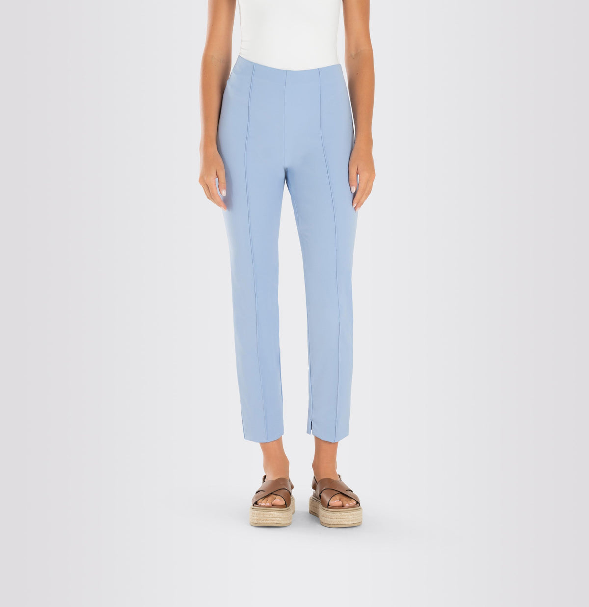 Introducing the MAC - ANNA PULL ON PANT by MAC, a pair of beige dress pants with a tailored fit featuring seam detailing along the front. Made from easy-care material, these slim-fit pants have a straight-leg cut and are showcased laid flat on a white background.
