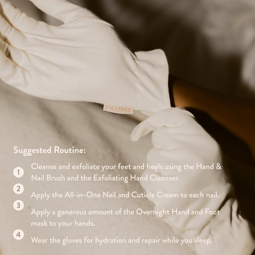 PAUME - ORGANIC COTTON OVERNIGHT GLOVES by PAUME are soft, off-white gloves with a subtle sheen, elastic wrists, and a simple design. Made from organic cotton, they’re perfect for nighttime moisturizing and shown on a matching beige background.