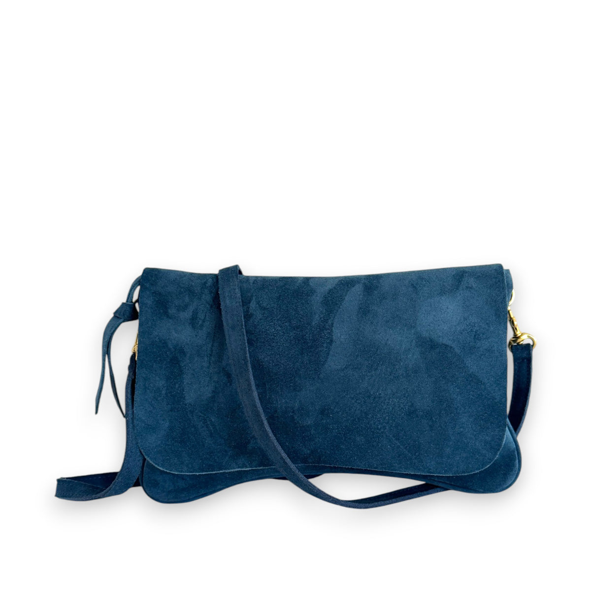 The OLIVEVE Cecilia Crossbody in Aegean Italian Leather, featuring a curved flap, long detachable strap, subtle stitching, and a discrete tassel detail, is elegantly displayed against a plain white background.