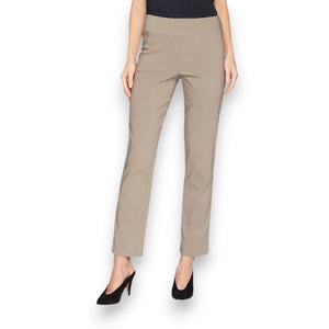 A person is wearing KRAZY LARRY, INC's PULL ON ANKLE PANT in a slim fit beige straight-leg style and black high-heeled shoes against a white background. The outfit is completed with a sleeveless black top that reveals part of the arms and torso.