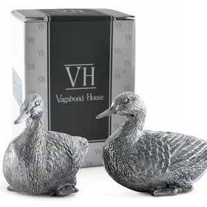 VAGABOND HOUSE's Pewter Duck Salt and Pepper Set showcases two ducks with detailed feather engravings, sitting slightly forward with dispensing holes on their backs.