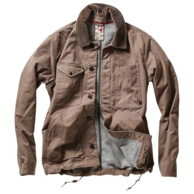 Three folded RELWEN Pile-Lined Chore Coats in Tobacco, Olive, and Charcoal are stacked, highlighting classic workwear style with buttoned front pockets and prominent stitching details. The rugged fabric texture and metal buttons of each RELWEN jacket are clearly visible.