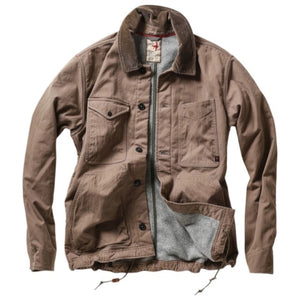 Three folded RELWEN Pile-Lined Chore Coats in Tobacco, Olive, and Charcoal are stacked, highlighting classic workwear style with buttoned front pockets and prominent stitching details. The rugged fabric texture and metal buttons of each RELWEN jacket are clearly visible.