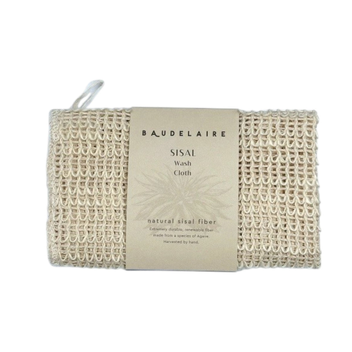 The BAUDELAIRE - SISAL WASH CLOTH by BAUDELAIRE is crafted from natural sisal fiber, harvested by hand, and features a woven texture with a brown paper label that reads “Baudelaire Sisal Wash Cloth, natural sisal fiber, harvested by hand.” This gentle exfoliator is ideal for daily cleansing or as a facial scrub, offering the benefits of natural sisal to your skincare routine.