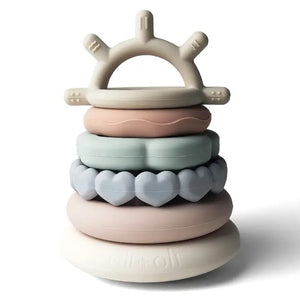 Introducing the SILICONE SUN STACKING RING TOWER from ALI + OLI: a set of BPA-free silicone stacking rings in soft pastel hues. The rings come in various shapes and textures, including hearts, and feature a sun-shaped topper on a sturdy base. This baby development toy is designed to promote motor skills and creativity.