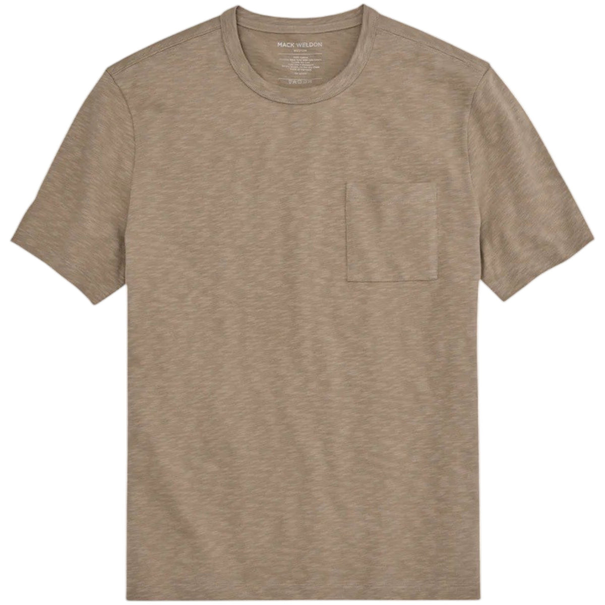 A man with short curly hair and a beard wears the MACK WELDON Heavyweight Slub Cotton Pocket T-Shirt in Desert Taupe and dark pants, standing against a plain white background.