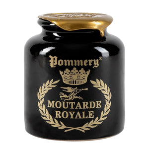 A black ceramic jar with gold text and designs, labeled “FRENCH ROYAL MUSTARD WITH COGNAC” by FRENCH FEAST, features a crown and laurel wreath. This elegant jar holds authentic mustard, sealed with gold wax on the lid.