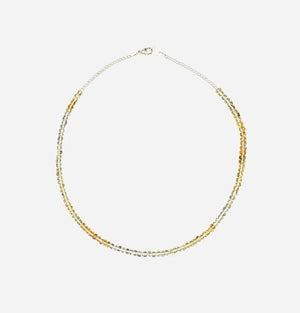 The ANN LIGHTFOOT - FACETED CITRINE RAS DU COU NECKLACE features faceted citrine stones with alternating silver and gold beads in a symmetrical design, secured by a sterling silver clasp, shown on a plain white background.