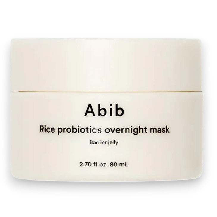 A white jar labeled &quot;ABIB - RICE PROBIOTICS OVERNIGHT MASK BARRIER JELLY 80ML&quot; from ASIAN BEAUTY WHOLESALE, shown on a plain white background; this hydrating sleep mask provides overnight moisture and probiotics for your skin.