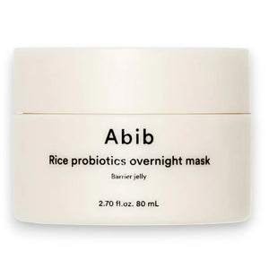 A white jar labeled "ABIB - RICE PROBIOTICS OVERNIGHT MASK BARRIER JELLY 80ML" from ASIAN BEAUTY WHOLESALE, shown on a plain white background; this hydrating sleep mask provides overnight moisture and probiotics for your skin.