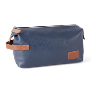The VIENNA TOILETRY BAG IN NAVY by BEYBERK INTERNATIONAL features a rectangular navy blue leather design with brown accents, side handle, and top zipper closure, displayed on a plain white background.