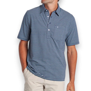 The CRIQUET Performance Players Shirt in Duval Stripe—Navy features neatly folded navy and white horizontal stripes, a collar, and a front pocket, showcased on a black background.