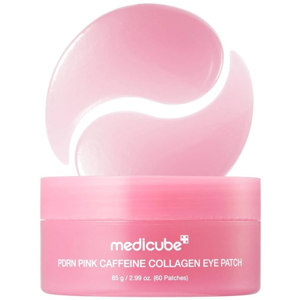 A pink tub labeled “MEDICUBE - PDRN CAFFEINE COLLAGEN EYE PATCH” from KOSMIC KBEAUTY SKINCARE, shown opened with a pair of crescent-shaped pink gel patches displayed above the container. These under-eye patches are infused with collagen to help hydrate and refresh the skin.