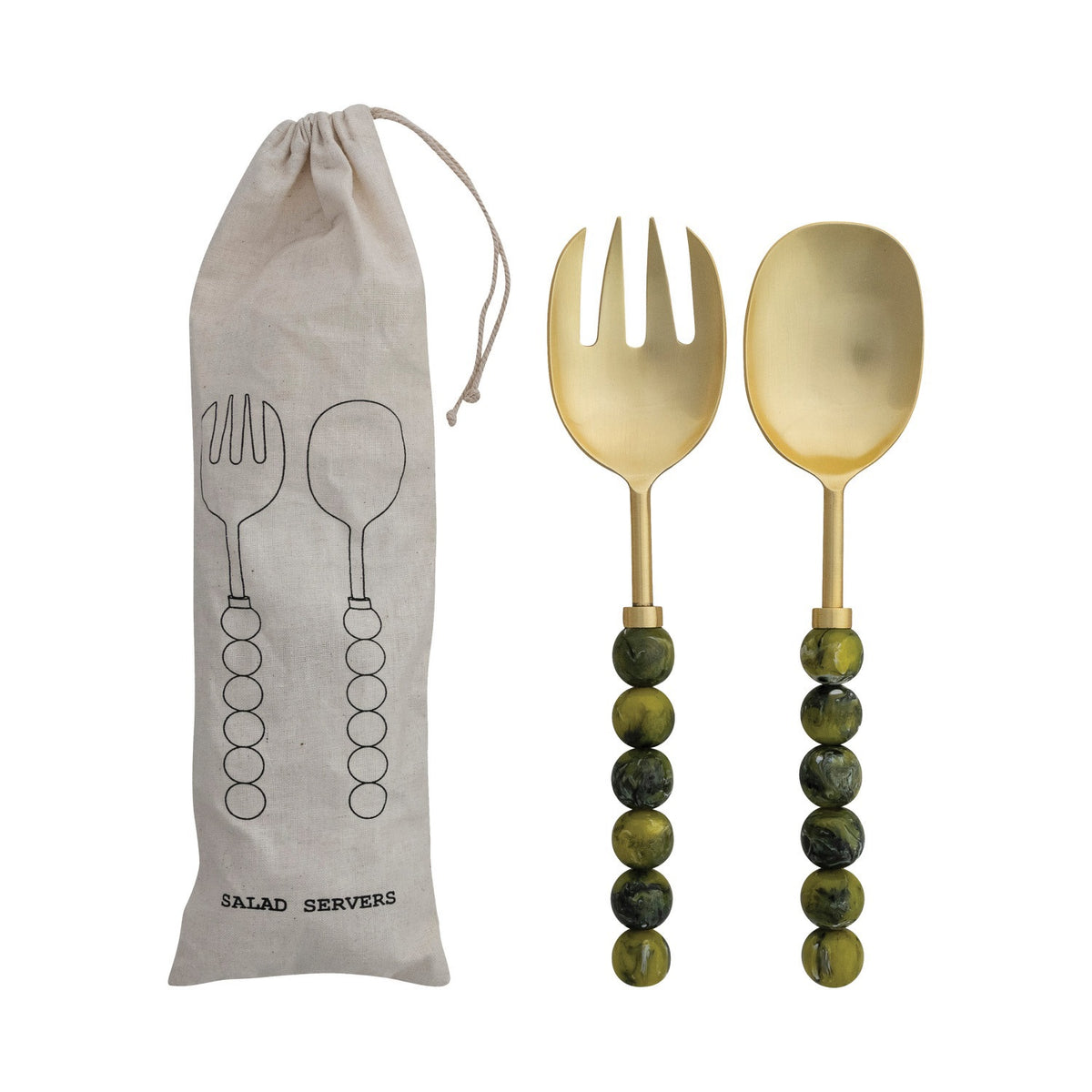 The CREATIVE COOP GOLDTONE SALAD SERVERS WITH GREEN RESIN BALL HANDLES include a fork and spoon, paired with a beige drawstring bag featuring illustrated utensils and "SALAD SERVERS" labeling.