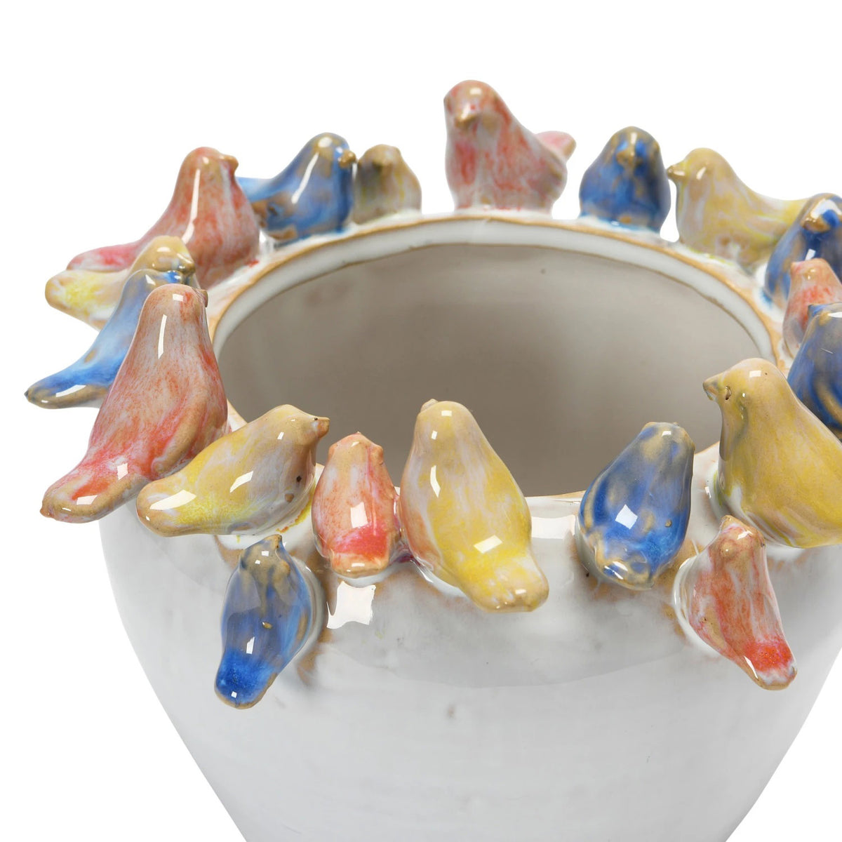The PLANTER W BIRDS ON RIM by CREATIVE COOP is a ceramic piece made entirely from stoneware, showcasing a smooth, white exterior with small pastel-colored bird sculptures—yellow, pink, and blue—gracefully adorning the rim.