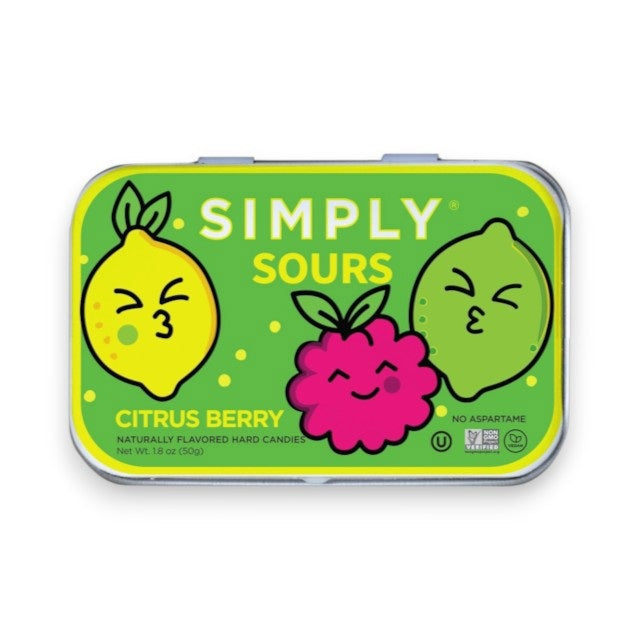 A green tin from SIMPLY GUM labeled “SIMPLY SOURS - CITRUS BERRY” features cartoon lemon, lime, and berry characters making puckered faces. The tin advertises naturally flavored sour hard candies that are non-GMO, vegan, and free from aspartame.