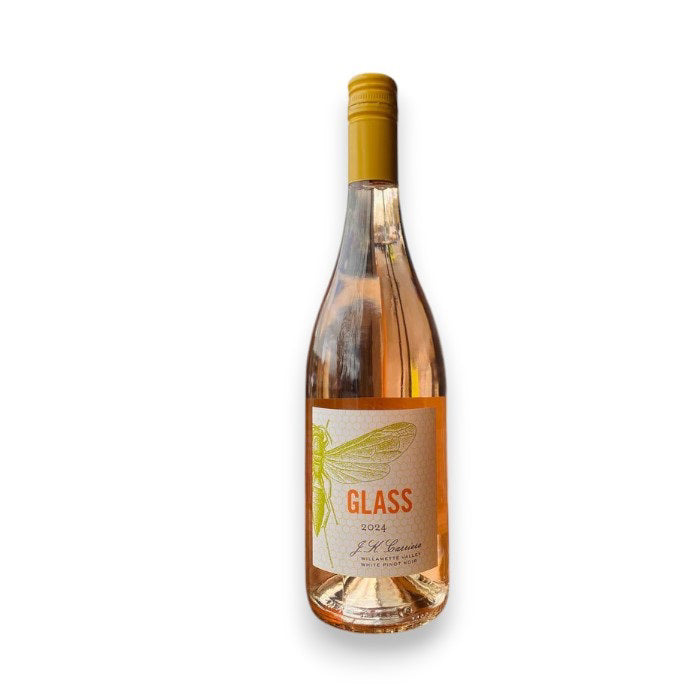 A clear bottle of JK CARRIERE GLASS ROSE 2024 from WINE: KELLOGG SELECTIONS, with a yellow cap and a cicada illustration on the label featuring "GLASS 2024" in orange. The bottle is photographed against a white background.