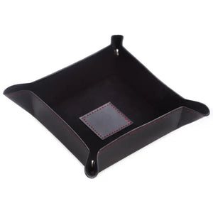 A BEYBERK INTERNATIONAL LEATHER SNAP VALET in black with red stitching, featuring visible edge stitching, is arranged neatly on a white background.