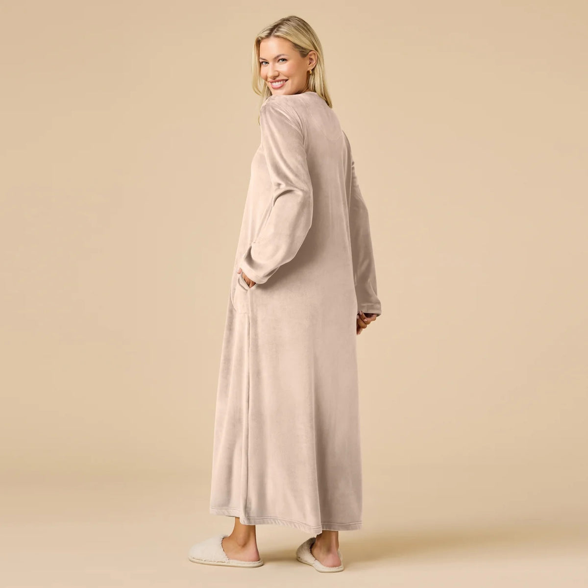 A long-sleeved, beige SOFTIES - SERENITY SHEAR MINK ZIP ROBE featuring a full-length zipper, round neckline, and two side pockets.